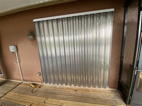 metal hurricane shutter panels